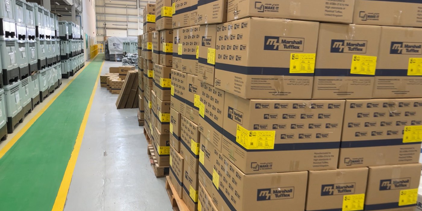 Marshall-Tufflex conduit and accessories palletised and racked in the Abu Dhabi warehouse
