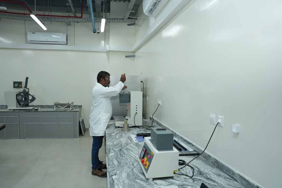 Technician carrying out material testing in the Vivasvaan laboratory