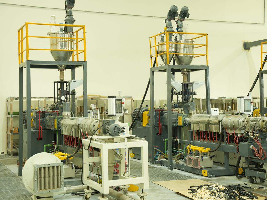 Twin-screw extruders feeding the conduit lines at KEZAD
